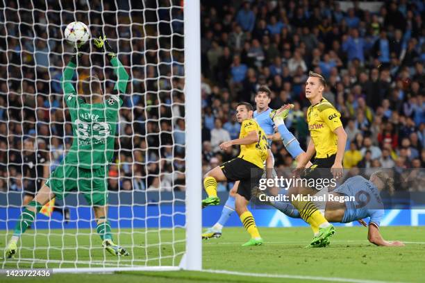 Erling Haaland of Manchester City scores their sides second goal during the UEFA Champions League group G match between Manchester City and Borussia...