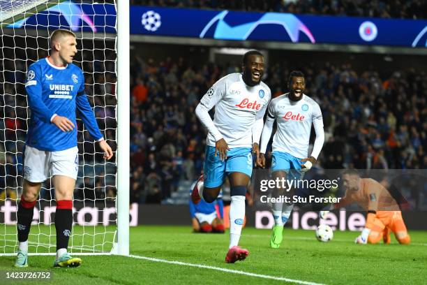 Tanguy NDombele of SSC Napoli celebrates after scoring their side's third goal during the UEFA Champions League group A match between Rangers FC and...