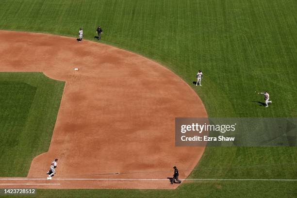 Third baseball Austin Riley of the Atlanta Braves fields a ball hit by Mike Yastrzemski of the San Francisco Giants in the third inning at Oracle...