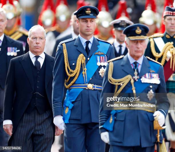 David Armstrong-Jones, 2nd Earl of Snowdon, Prince William, Prince of Wales and King Charles III walk behind Queen Elizabeth II's coffin as it is...