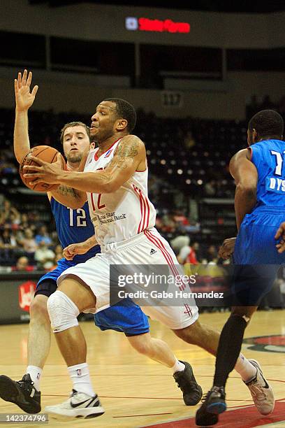 Will Conroy of the Rio Grande Valley Vipers drives the ball to the basket against Brady Morningstar of the Tulsa 66ers on March 31, 2012 at State...