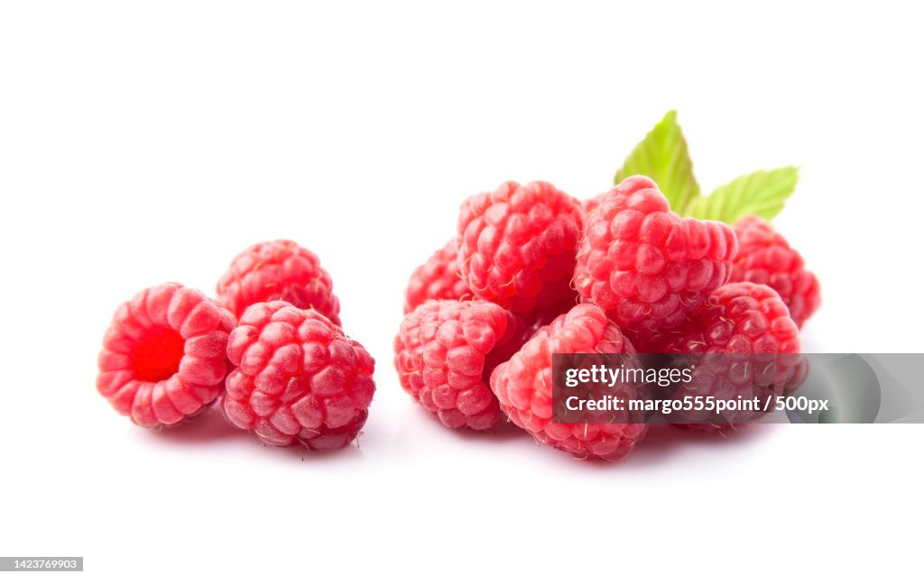 Close-up of raspberries against white background