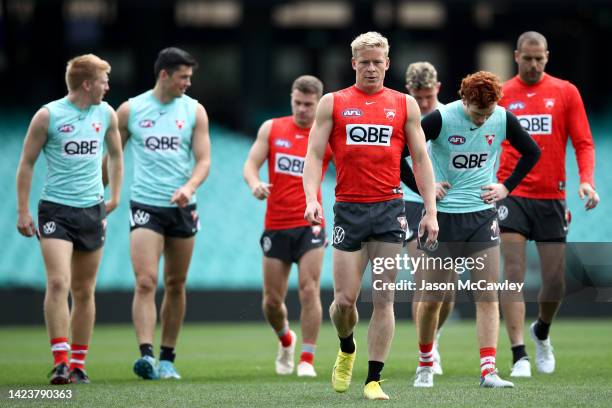 Isaac Heeney of the Swans looks on during a Sydney Swans AFL training session at Sydney Cricket Ground on September 15, 2022 in Sydney, Australia.