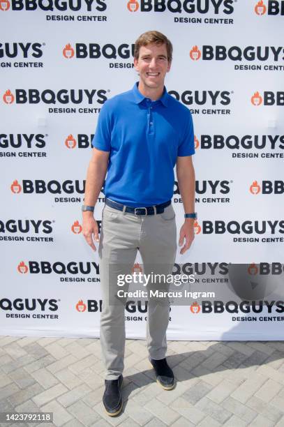 Eli Manning attends the BBQGuys Design Center grand opening at BBQGuys Design Center on September 14, 2022 in Alpharetta, Georgia.