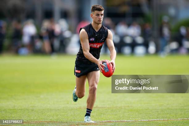 Nick Daicos of the Magpies in action during a Collingwood Magpies AFL training session at Olympic Park Oval on September 15, 2022 in Melbourne,...