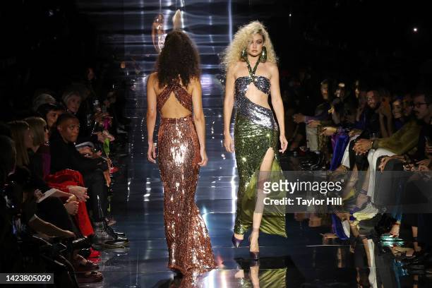 Bella Hadid and Gigi Hadid walks the runway at the Tom Ford S/S 2023 fashion show during New York Fashion Week at Skylight on Vesey on September 14,...