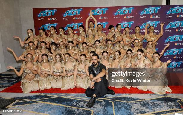 Nadim Cherfan with the dance group Mayyas, winners of Season 17, pose on the red carpet for "America's Got Talent" Season 17 Finale at Sheraton...