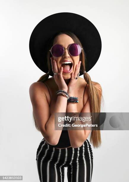 ecstatic young woman - groupie stock pictures, royalty-free photos & images