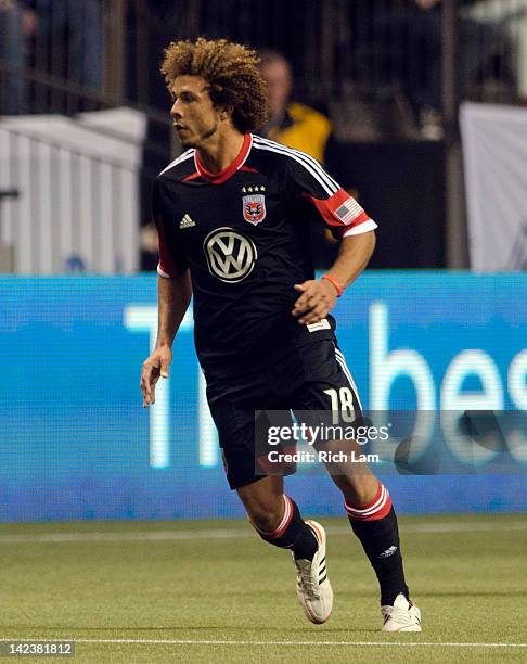 Nick DeLeon of D.C. United runs during MLS soccer action against the Vancouver Whitecaps on March 24, 2012 at B.C. Place in Vancouver, British...