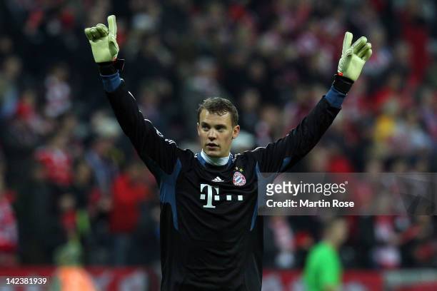 Manuel Neuer, goalkeeper of Muenchen celebrates after the UEFA Champions League quarter-final second leg match at Allianz Arena on April 3, 2012 in...