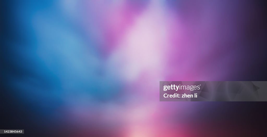 Cloud illuminated by neon lights at night