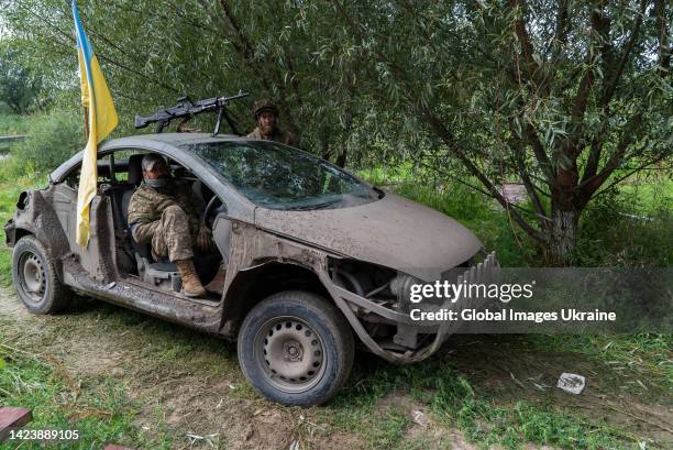 Ukrainian servicemen with callsign “Pfizer” from 25th Airborne Brigade sits in car with colleague on September 14, 2022 in Izium Ukraine. Almost 70%...