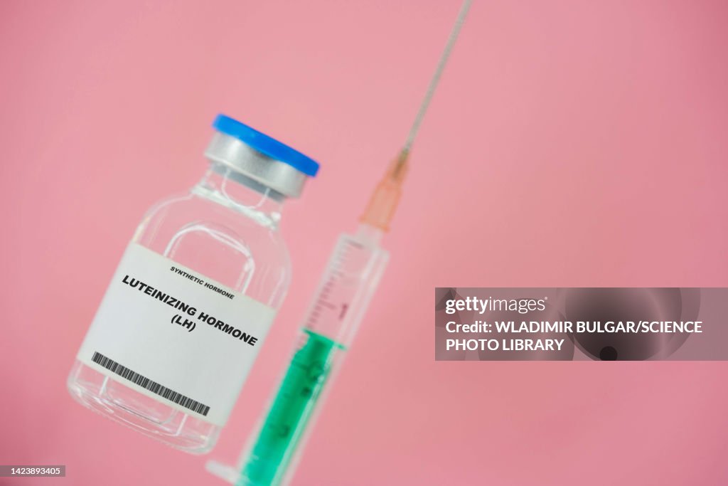 Syringe and vial of luteinizing hormone, conceptual image