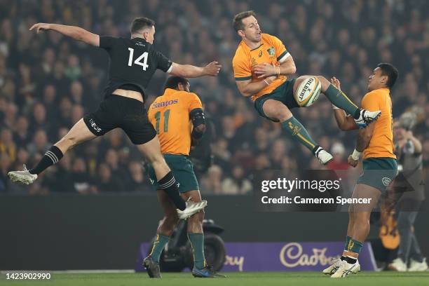 Bernard Foley of the Wallabies and Will Jordan of the All Blacks compete for the ball during The Rugby Championship & Bledisloe Cup match between the...