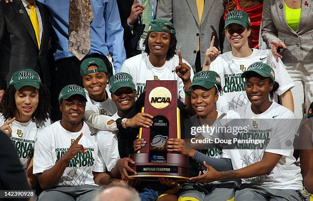 The Baylor Bears celebrate with the National Championship trophy after they won 80-61 against the Notre Dame Fighting Irish during the National Final...