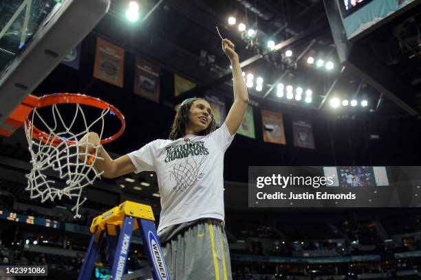 Brittney Griner of the Baylor Bears celebrates after she cuts down a piece of the net after they won 80-61 against the Notre Dame Fighting Irish...