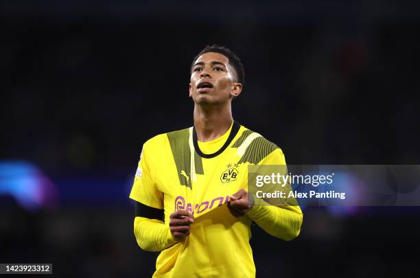 Jude Bellingham of Borussia Dortmund celebrates after scoring his sides first goal during the UEFA Champions League group G match between Manchester...