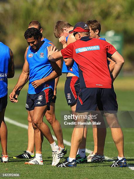 Coach Mark Neeld jokes with Aaron Davey during a Melbourne Demons AFL training session at AAMI Park on April 4, 2012 in Melbourne, Australia.