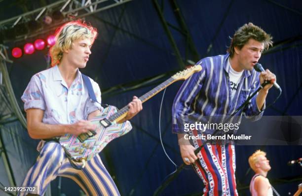 Andi and Campino of Die Toten Hosen perform on stage at Olof Palme Festival, Garching, München, Germany, September 1987.
