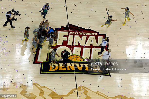 The Baylor Bears celebrate on the court after they won 80-61 against the Notre Dame Fighting Irish during the National Final game of the 2012 NCAA...