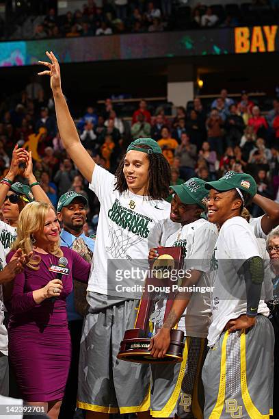 Brittney Griner, Jordan Madden and Odyssey Sims of the Baylor Bears celebrate with the National Championship trophy as they are interviewed by Holly...