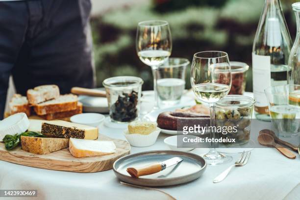 food and wine on table for picnic - cheese and wine bildbanksfoton och bilder
