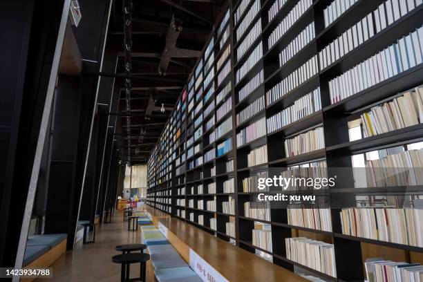 public library bookcase - bookstore ストックフォトと画像