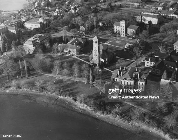 High angle view of the campus of Hampton University, with the clocktower of the Monroe Memorial Church rising prominently in the centre among...