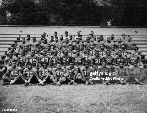 Unspecified Black American Football players of Allen University, the Yellow Jackets, pose for a team portrait in the grounds of Allen University in...
