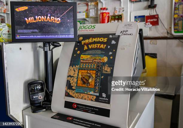 View of on-line betting machine able to pick numbers for the 160 million euro Euromilhões transnational lottery, the day before the drawing, in Café...