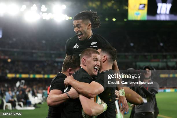 Jordie Barrett of the All Blacks celebrates with teammates after scoring the match winning try during The Rugby Championship & Bledisloe Cup match...