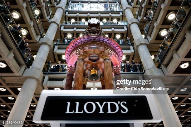 The Lutine Bell hangs in the center of the atrium underwriting room at Lloyd's of London on September 15, 2022 in London, England. The bell was rung...