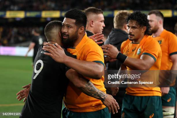 Aaron Smith of the All Blacks and Folau Fainga'a of the Wallabies embrace during The Rugby Championship & Bledisloe Cup match between the Australia...
