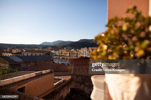 view of italian city from a terrace. - blick durchs fenster aussenaufnahme haus stock-fotos und bilder