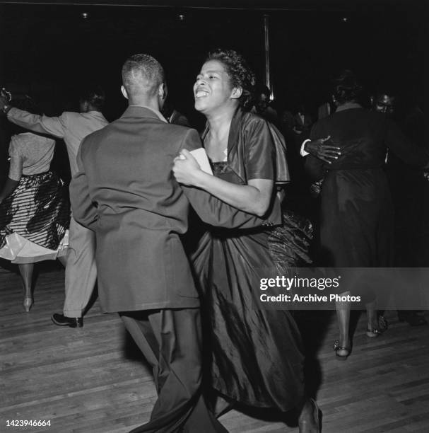 Black Americans take to the dancefloor to show off their 'Swing' dance moves at the Savoy Ballroom in Harlem, New York City, New York, United States,...