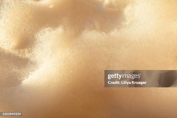 abstract background with foam in sunset light. - sea foam stock pictures, royalty-free photos & images