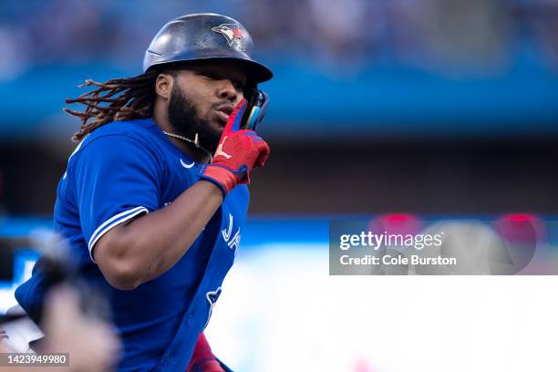 Vladimir Guerrero Jr. #27 of the Toronto Blue Jays runs out a solo home run, his 100th career home run, in the first inning of their MLB game against...