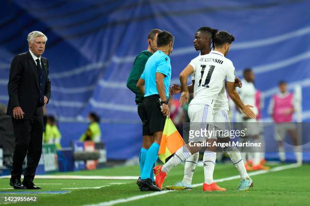 Marco Asensio of Real Madrid replaces Eduardo Camavinga of Real Madrid during the UEFA Champions League group F match between Real Madrid and RB...