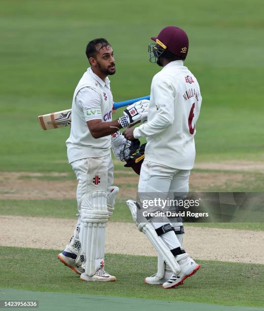 Saif Zaib of Northamptonshire celebrates after with team mate Lizaad Williams scoring a century during the LV= Insurance County Championship match...