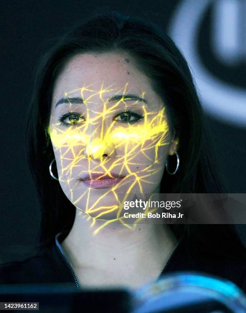 Kimi Ellie of Los Angeles has her face scanned and tracked inside an exhibit at Consumer Electronics Show, January 7, 2015 in Las Vegas, Nevada.