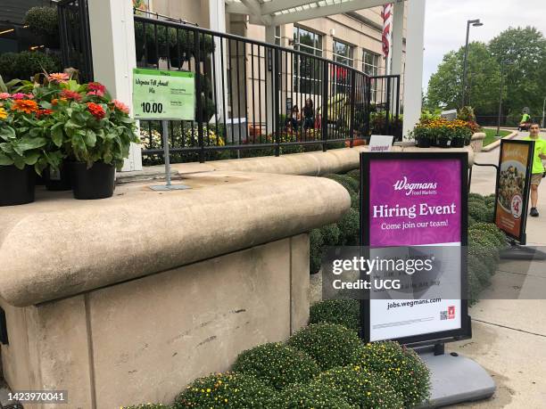 Wegmans high-end grocery store with signs for Hiring Event, Boston, Massachusetts.