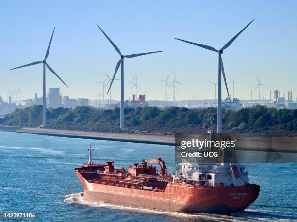 Wind turbines in the Maas Estuary, approaching Rotterdam Container Port, the Netherlands.