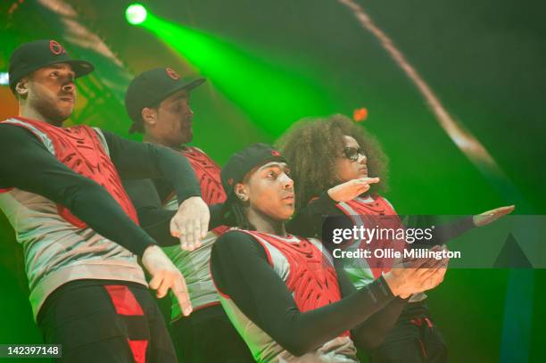 Ashley Banjo, Jordan Banjo and Perri Kiely of Diversity perform during the 2012 Digitized: In a Game Tour on stage at Nottingham Capital FM Arena on...