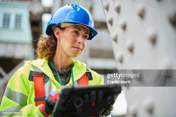 female steelworker survey - civil engineer stock pictures, royalty-free photos & images