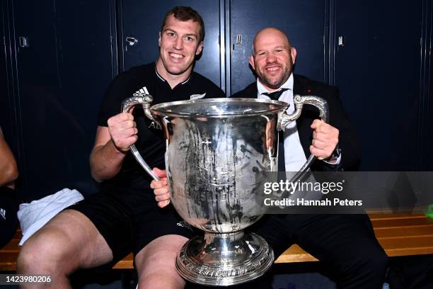 Brodie Retallick and forwards coach Jason Ryan of the All Blacks celebrate with the Bledisloe Cup after winning The Rugby Championship & Bledisloe...