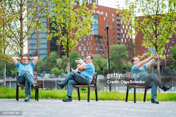 multi tasking, not enough time. one man clones on bench in park doing different things - multiple image overlay stock pictures, royalty-free photos & images