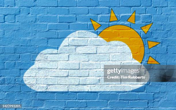 graffiti of sun and clouds - 天気予報 ストックフォトと画像