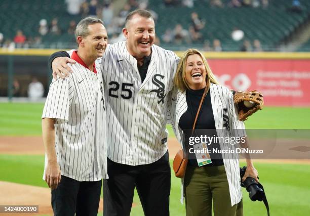 Jeff Idelson, Jim Thome and Jean Fruth pose for a photo prior to a game between the Chicago White Sox and the Colorado Rockies at Guaranteed Rate...