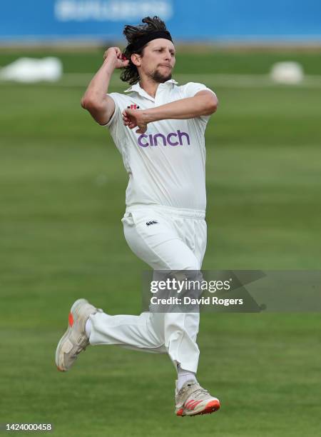 Jack White of Northamptonshire bowls during the LV= Insurance County Championship match between Northamptonshire and Surrey at The County Ground on...