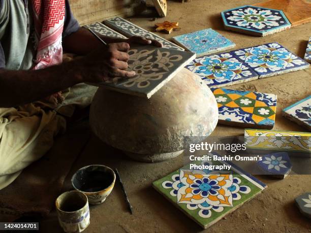 blue tiles made of clay being produced - pakistani stock pictures, royalty-free photos & images